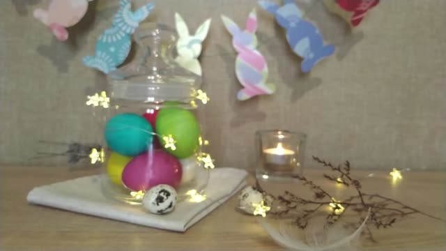 Easter-decoration-blurred-falling-feather