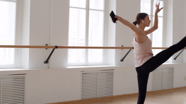 Ballerina-Dancing-in-Ballet-Studio