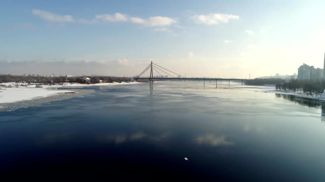 Landscape-with-suspension-Moscow-Bridge-(renamed-South-bridge)-across-the-Dnieper-river,-Obolon,-Kiev,-Ukraine