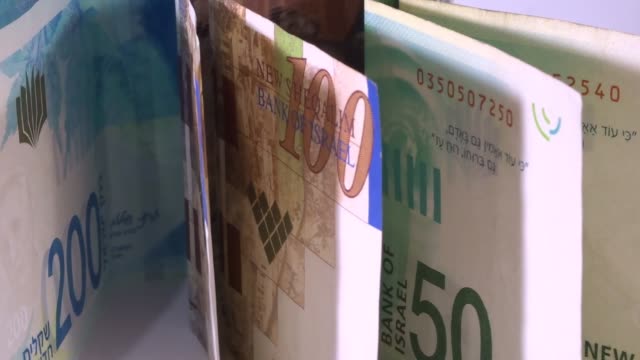 Israeli-money,-shekels-bills-in-motion