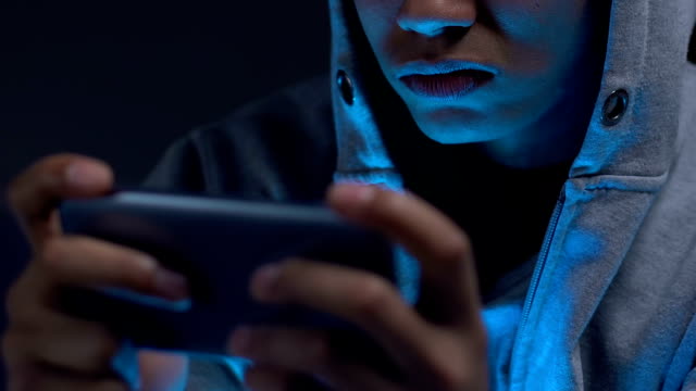 Black-college-student-frustrated-with-losing-game-on-smartphone,-addiction