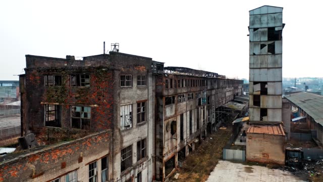 Aerial-view-of-an-old-factory-ruin-and-broken-windows.
