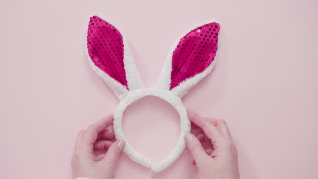 Easter-bunny-ears-on-a-pink-background.