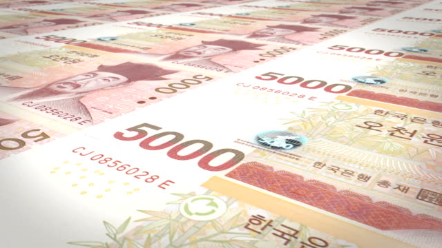 Banknoten-der-fünftausend-Wons-von-Südkorea-Rollen,-Bargeld,-Schleife