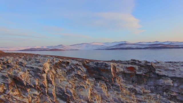 4K.-Aerial-survey-from-the-air.-Winter.-Lake-Baikal.-Small-sea.