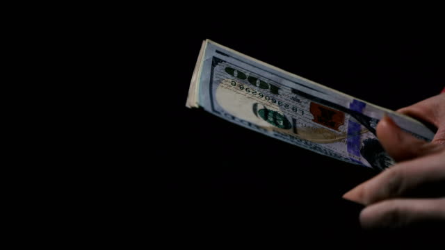 Money.-Hands-count-dollars