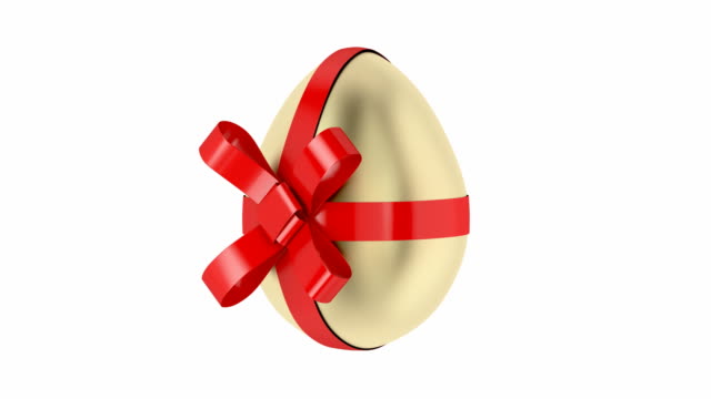 Gold-egg-with-red-ribbon