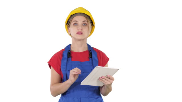 Woman-engineer-checking-building-plan-on-touchpad-and-looking-at-objects,-buildings-around-her-on-white-background