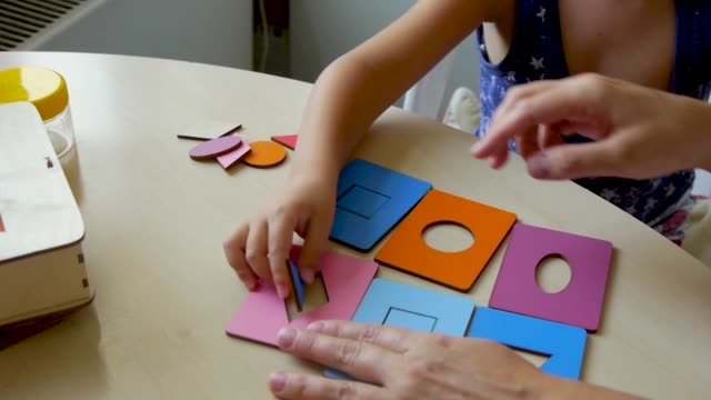 autistic-child-puzzles-closeup2