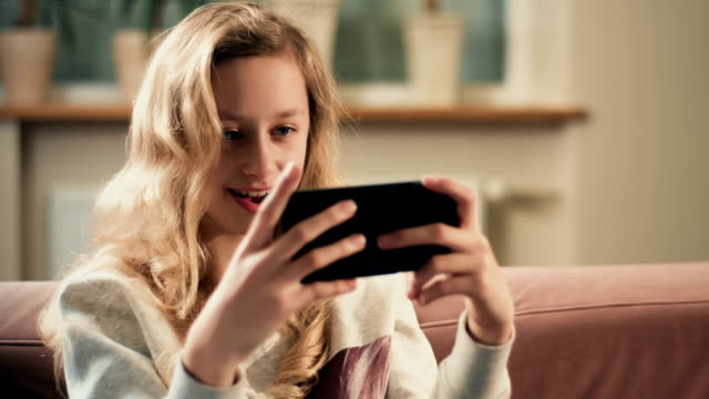 Child-playing-new-smartphone-app-game