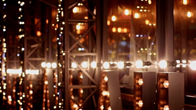 Electric-garland-decorating-evening-restaurant,-Christmas-mood-and-relaxation