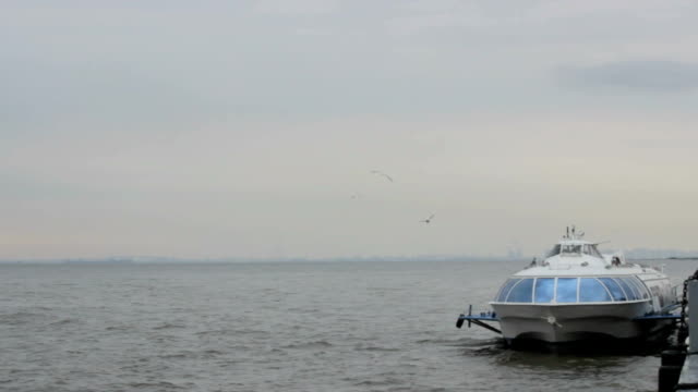 Passenger-Air-boat-rocking-on-the-waves-at-berth