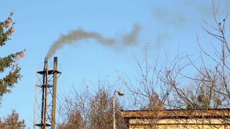 Aerial-view-of-Moscow-with-smoke-goes-from-tubes-of-power-plant-in-cold-day-at-winter