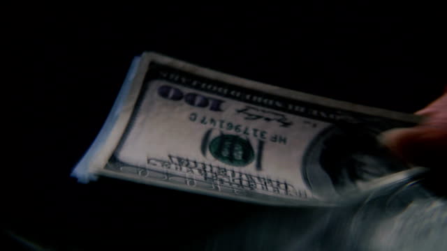 Money.-Hands-count-dollars