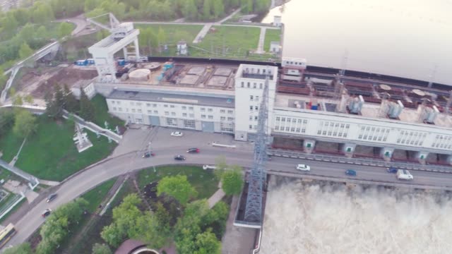 Top-view-of-the-hydroelectric-power-station-on-the-river.-Clip.-Cheap-electricity-at-the-modern-hydroelectric-power-station