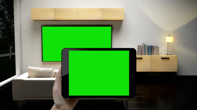 Green-Screen,-berühren-IoT-smart-Pad,-Tablet-Steuerung-im-Wohnzimmer,-intelligente-Haushaltsgeräte,-Internet-der-Dinge.-4-k-Film.