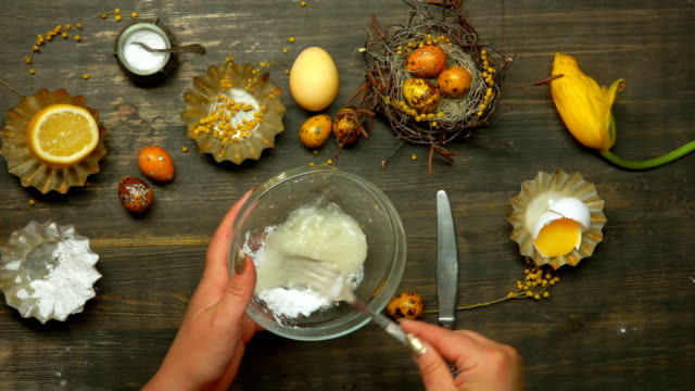 Hand-whipping-egg-white-for-easter-baking-glaze