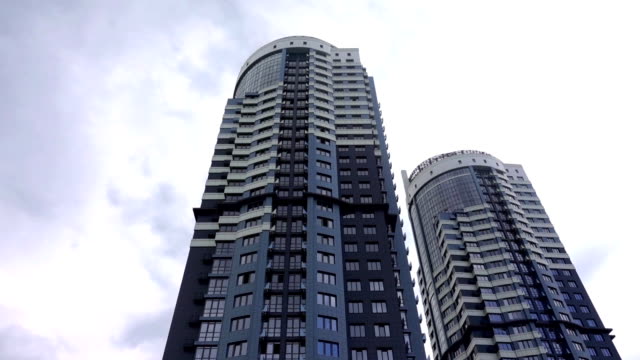 Two-high-rise-houses-skyscrapers-shrouded-in-mist.