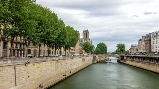 Notre-Dame-de-Paris-and-Seine-timelapse-hyperlapse-is-the-one-of-the-most-famous-symbols-of-Paris