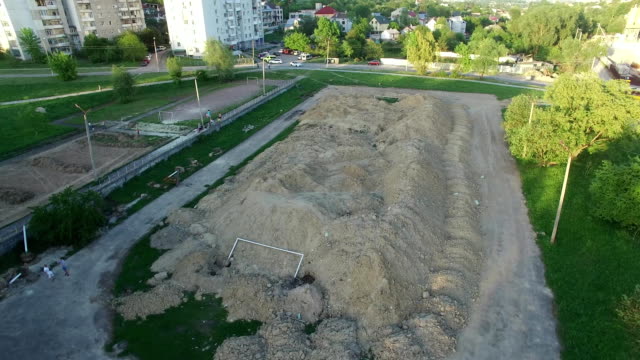 Aerial-shot-of-football-field-preparing-for-construction-new-stadium.