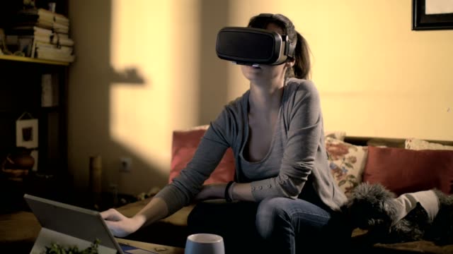 Designer-working-with-virtual-reality-headset-at-smart-home