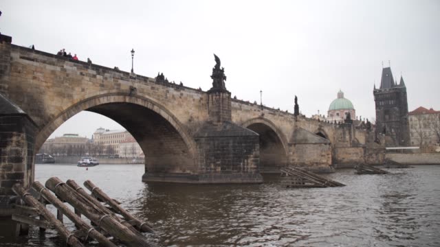 Charles-Bridge-in-the-Czech-Republic.-View-from-the-river.-Camera-in-motion.-4K-Slow-Mo