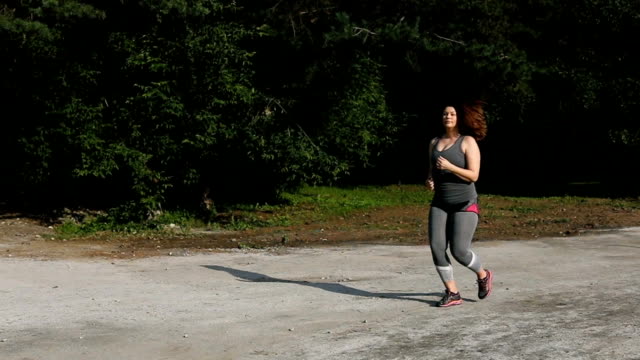 Overweight-woman-running.-Weight-loss-concept.