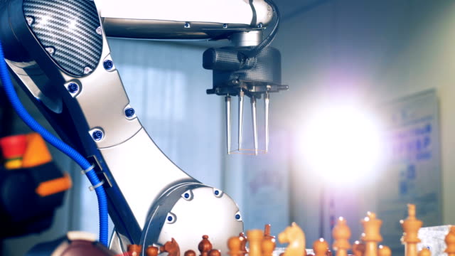 Innovative-robot-chessplayer.-Artificial-intelligence,-machine-intelligence-concept.