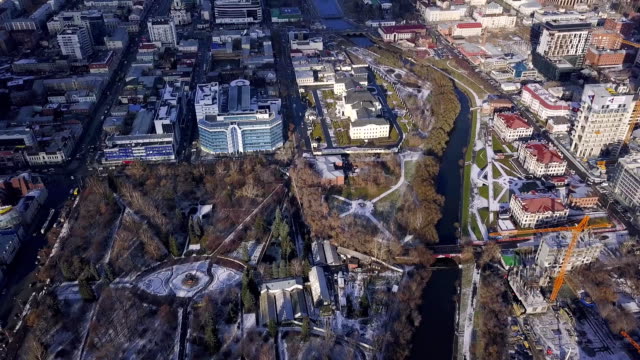 Aerial-view-of-a-modern-and-clean-city-with-lots-greenery-and-white-buildings.-Clip.-Top-view-of-the-modern-city-with-greenery