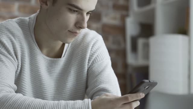 Rude-boy-spying-his-girlfriend's-smartphone