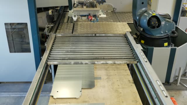Fully-automatic-panel-bending-center-in-metal-factory-for-shaping-steel