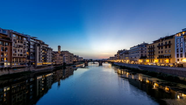 Twilight-sky-scene-of-Ponte-Santa-Trinita-Holy-Trinity-Bridge-day-to-night-timelapse-over-River-Arno