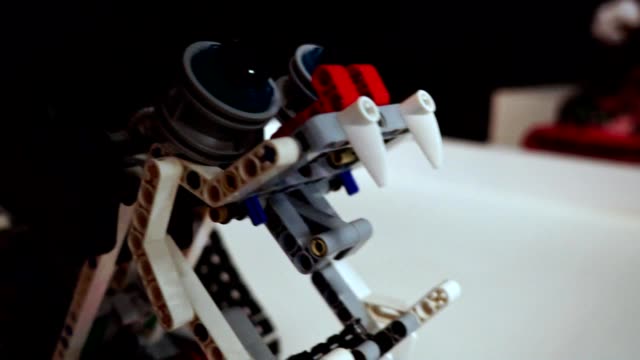 Homemade-robot-from-the-constructor-opens-mouth-and-shows-teeth
