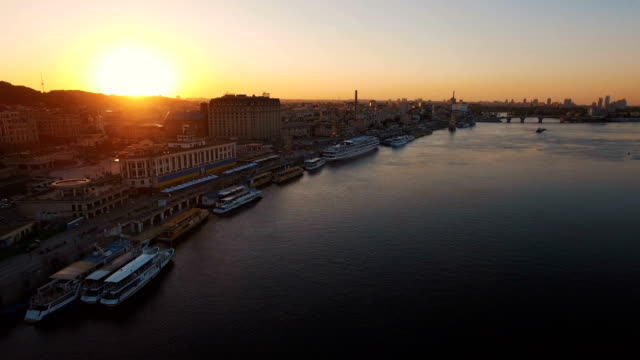 River-port-with-boats-in-the-old-part-of-town-at-sunset-aerial