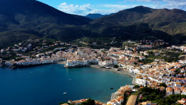 Aerial-drone-video-footage-of-Cadaques-Spain.-the-camera-moves-along-the-coast.-sunny-daylight