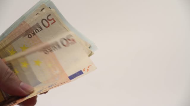 4K-Close-up-hands-counting-euros-bills-of-fifty-and-one-hundred.-Count-money
