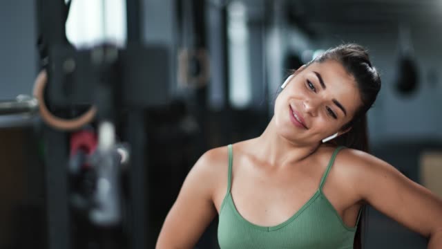 Woman-fitness-blogger-talking-shooting-video-of-warm-up.-Medium-close-up-shot-on-4k-RED-camera