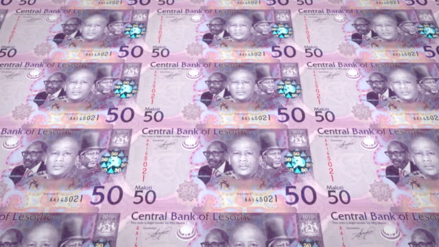 Banknoten-von-50-Maloti-oder-Lotis-Lesothos-Rollen,-Bargeld,-Schleife