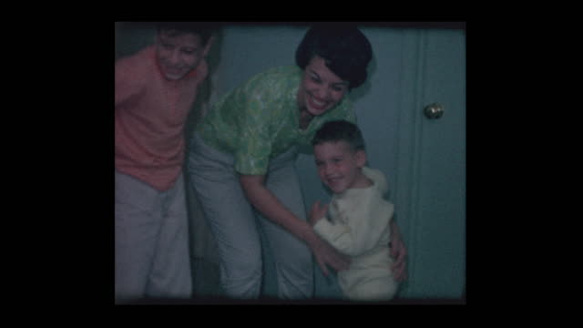 1963-Mother-surprises-young-son-with-new-sandbox