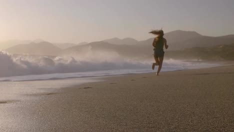 Woman-Jogging-on-the-Beach
