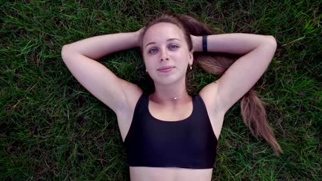 woman-lying-on-the-grass