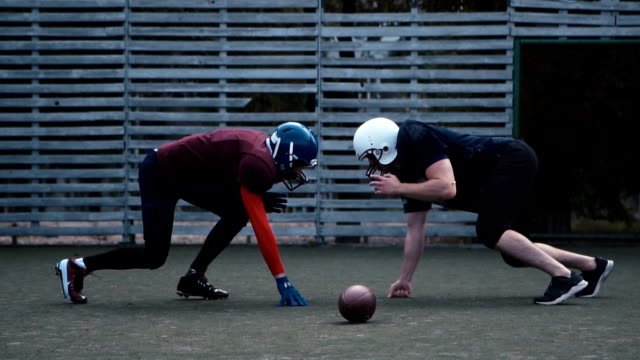 Two-helmeted-football-players