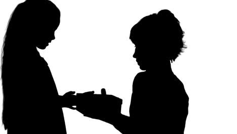 Silhouette-Pretty-caucasian-woman-getting-chrismas-gift-from-her-daughter-track-matte