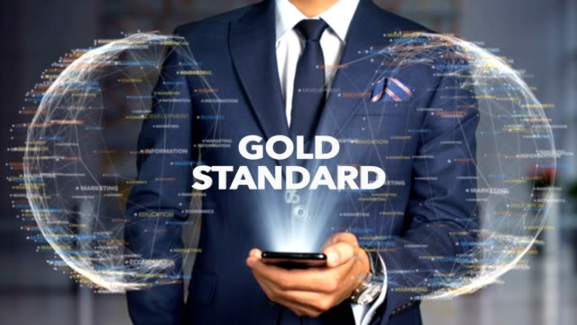 Businessman-Hologram-Concept-Economics---Gold-standard