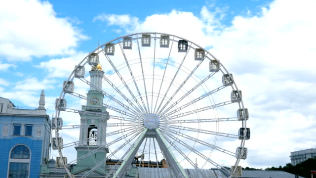 Close-up-big-white-ferris-wheel-rotates-in-Kiev-city,