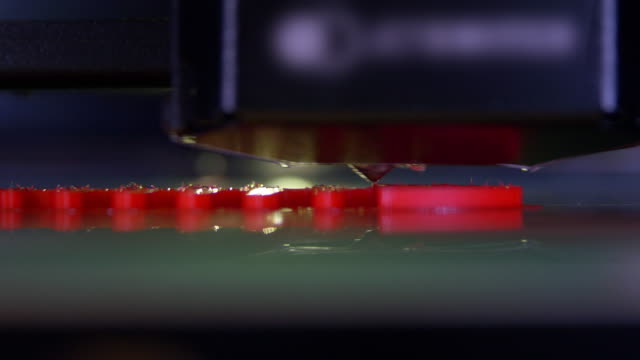 3D-printer-working-close-up.-Automatic-three-dimensional-3d-printer-performs-plastic.-Modern-3D-printer-printing-an-object-from-the-hot-molten.-Concept-progressive-additive-technology-for-3d-printing.