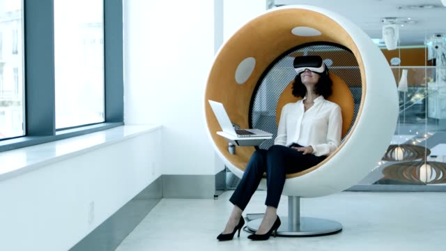 Content-businesswoman-in-vr-headset