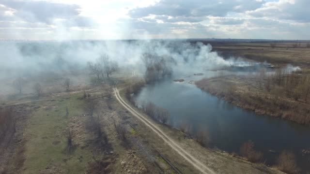 The-smoke-from-the-burning-of-dry-grass-(drone-image).