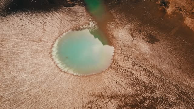 volcano-lake-in-Kamchtka-aerial-drone-view.-Aerial-shot-of-the-volcano-crater-lake-in-Kamchatka-famous-place.