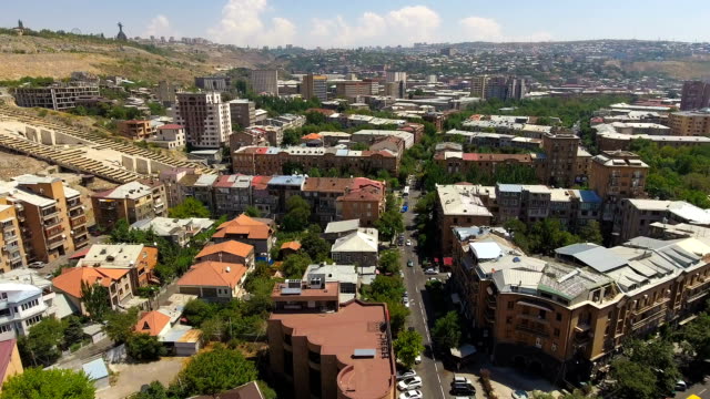 Aerial-panoramic-view-of-Yerevan-city-with-famous-Cascade-stairway,-sightseeing